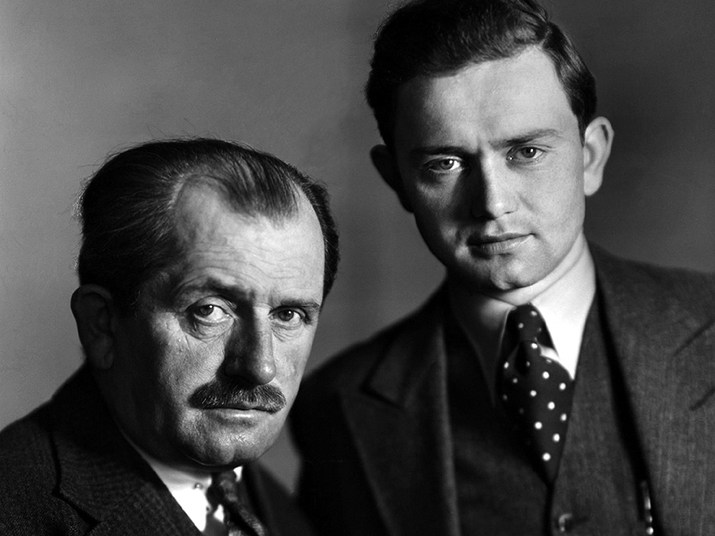 Schwarz-Weiß-Porträt von Ferdinand Porsche und Hans-Peter Porsche. 